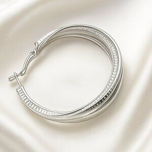 Polished Silver Ribbed Twist Hoop Earrings – Classic Textured Statement Jewelry